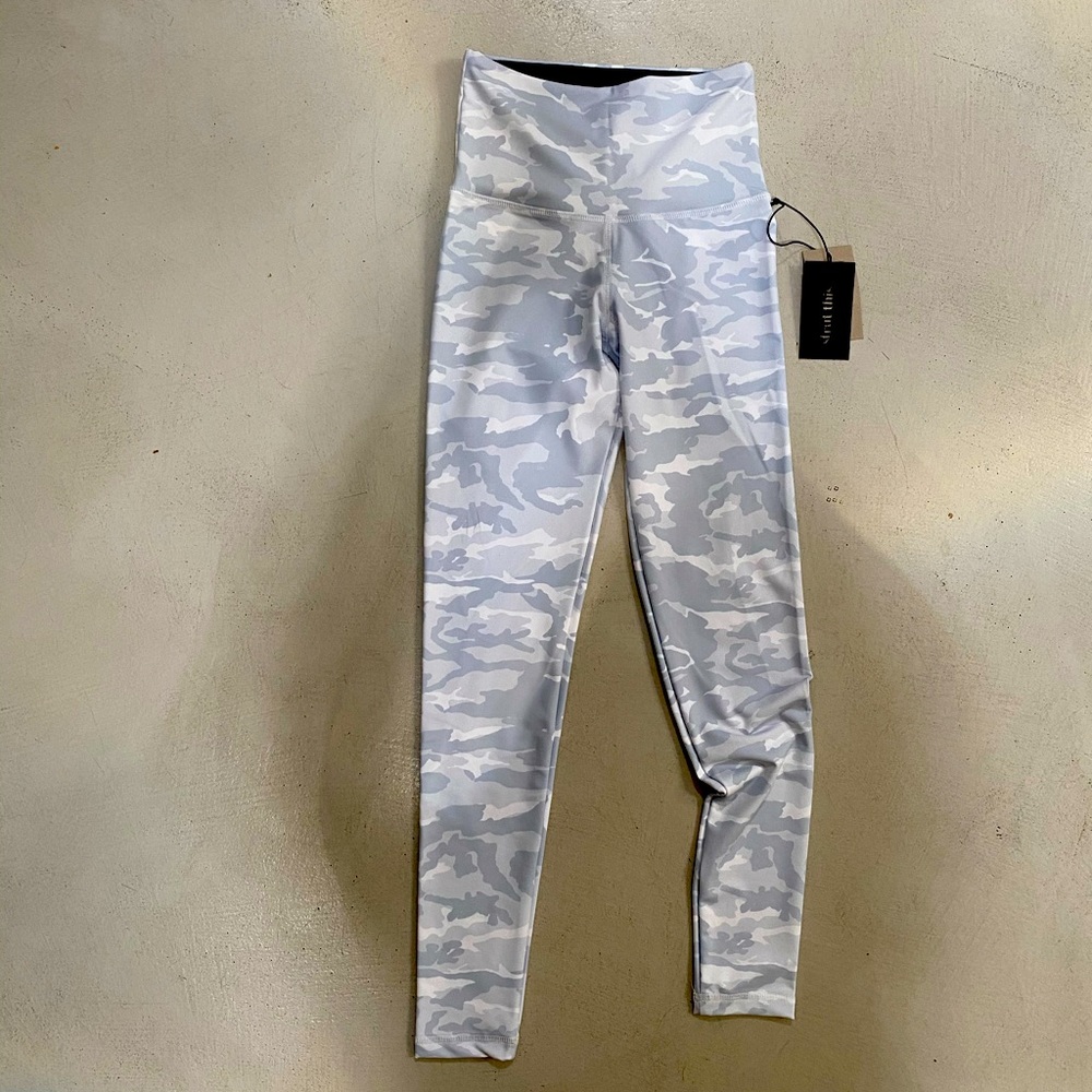 Strut this white and grey camo leggings
